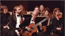  ??  ?? Since 1978, Jim McCutcheon has taught at the University of Dayton, institutin­g the classical guitar program there and at Wright State University, where he has establishe­d an endowed scholarshi­p for guitar students.