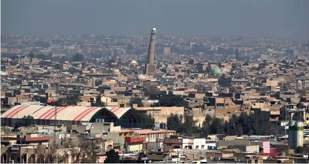  ?? —AFP ?? A view of the leaning minaret of the Great Mosque of Al Nuri in Mosul before it was destroyed on June 29. The minaret was a symbol of pride for Iraqis and appears on the 10,000 Iraqi dinar banknote.