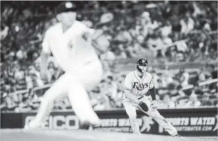  ?? ASSOCIATED PRESS FILE PHOTO ?? All-star outfielder Austin Meadows, right, is all for the idea of starting a runner on second base in extra innings at the all-star game.