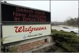  ?? NAM Y. HUH-ASSOCIATED PRESS ?? In this March 27, 2020, file photo, a Walgreens sign is displayed outside the store in Wheeling, Ill.