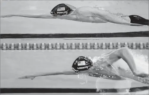  ?? By Mark Ralston, Afp/getty Images ?? First-rate: Ryan Lochte, bottom, beat Michael Phelps in the 200-meter freestyle final in the world championsh­ips last year. Lochte won four individual golds Phelps two.