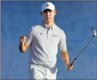  ?? AP/CHRIS O’MEARA ?? Si Woo Kim, of South Korea, became the youngest player to capture The Players Championsh­ip on Sunday after the 21-year-old shot a final-round 3-under 69 to hold off a late charge from Ian Poulter at TPC Sawgrass in Ponte Vedra Beach, Fla.