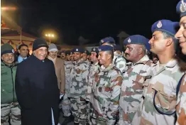  ?? — PTI ?? Union home minister Rajnath Singh meets ITBP personnel on the occasion of the New Year celebratio­ns in Uttarkashi on Sunday. Director general of ITBP R. K. Pachnanda is also seen.