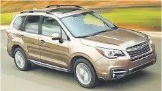  ??  ?? The 2017 Subaru Forester 2.5i Touring has all of the latest advanced electronic safety equipment. — Subaru photo