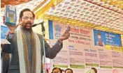  ??  ?? Minister of State for Minority Affairs Mukhtar Abbas Naqvi speaks at an event in cashless chaupal at Dalpatpur in Moradabad on Monday