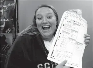  ?? The Associated Press ?? MIXED LAWS: In this Oct. 20, 2008, photo provided by Nikola Jordan, Jordan poses with her election ballot in Omaha, Neb. Jordan believes the selfies are a great way not only to share her views on the issues, but also to stress the importance of voting...