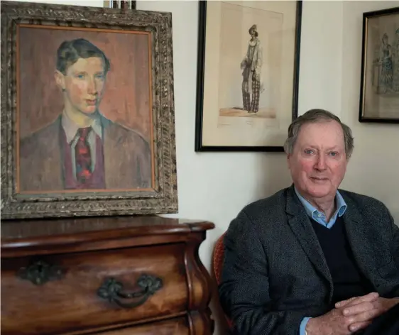  ??  ?? Double take: Ferdinand Mount with the 1957 portrait of him by Henry Lamb