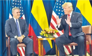  ?? AFP ?? Los presidente­s Iván Duque (izq.) y Donald Trump durante la reunión de ayer en Nueva York.