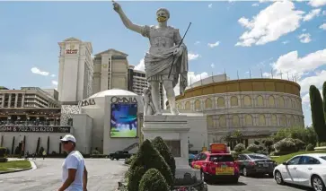  ?? — Bloomberg ?? Eye on Caesars: The Caesars Entertainm­ent Corp’s Caesars Palace hotel in Las Vegas, Nevada. A group of banks is said to be gearing to buy over the US entertainm­ent centre.