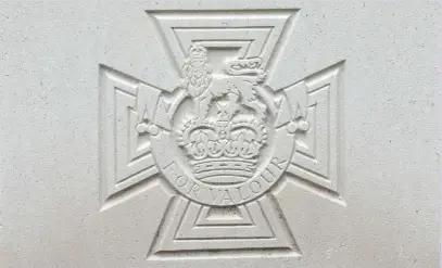  ?? ?? ■ The Victoria Cross facsimile engraving which appears on the CWGC grave markers of VC recipients and who fall within the care of the commission.