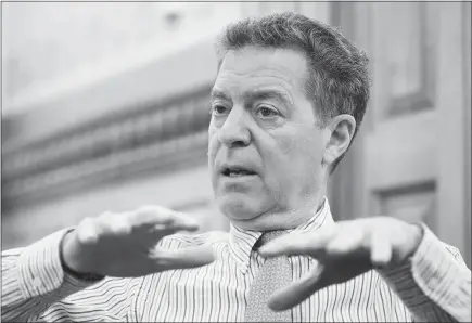  ?? CHARLIE RIEDEL / AP ?? Kansas Gov. Sam Brownback talks about his term as governor last month during an interview at the Kansas Statehouse in Topeka, Kan. Brownback was renominate­d to be U.S. ambassador-at-large for internatio­nal religious freedom after the U.S. Senate failed...