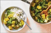  ?? STYLIST: MONICA PIERINI. JULIA GARTLAND/THE NEW YORK TIMES FOOD ?? A vegetable tofu curry. It’s a fast, one-pot vegetarian meal from Genevieve Ko, in which the tofu soaks up the flavorful curry sauce, and then gets tossed with the vegetables to serve over rice.