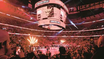  ?? CHICAGO TRIBUNE
JOHN J. KIM/ ?? Red lighting fills the stadium for Game 3 of the first-round playoff series between the Chicago Bulls and Milwaukee Bucks at United Center Friday, April 22, 2022, in Chicago.