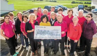  ??  ?? Castleross­e Golf Club Lady Captain Noreen Tobin and vice captain Chan Martin and Margaret Crowley with ladies members of the Castleross­e Golf Club presenting proceeds of their recent Charity Day, €1,000, to Marie O’Carroll Pieta House Killarney and...