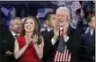  ?? CAROLYN KASTER — THE ASSOCIATED PRESS ?? Chelsea Clinton and former President Bill Clinton applaud as nominee Hillary Clinton speaks.