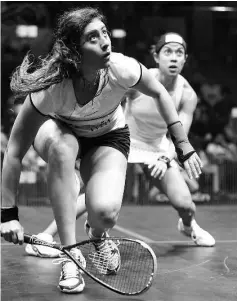  ??  ?? Nour El Sherbini of Egypt (L) eyes her return against Nicol David of Malaysia (R) during their quarter-final match of the PSA Women’s World Championsh­ips squash tournament in Bukit Jalil, oustide Kuala Lumpur on April 28, 2016. - AFP photo