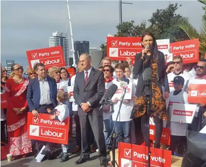  ??  ?? Labour leader Jacinda Ardern addresses a crowd in downtown Auckland .