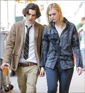  ??  ?? Timothée Chalamet and Elle Fanning in
A Rainy Day in New York.