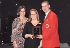  ??  ?? Accepting Outstandin­g Chapter Award: Annemarie Carr- GCYF advisor; Laura Walraven- GCYF Vice-president; Blake Haley-GYFA president.