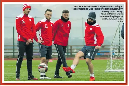  ?? PICTURE BY JAMES FALLON ?? PRACTICE MAKES PERFECT: At pre-season training at The Showground­s, Sligo Rovers first team players Garry Buckley, David Cawley, Adam McDonnell watch teammate Greg Bolger in action.