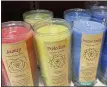  ?? COURTNEY DIENER-STOKES ?? Chakra energy jar candles by Aloha Bay can enhance your yoga session.