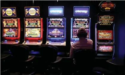 ?? Photograph: Loren Elliott/Reuters ?? The NSW Crime Commission says cashless gaming cards could combat the ‘$95bn-a-year informatio­n black hole’ surroundin­g the state’s pokies.