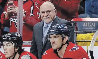  ?? ASSOCIATED PRESS FILE PHOTO ?? Capitals coach Barry Trotz, back, and Alex Ovechkin, right, have finally got past the second round.