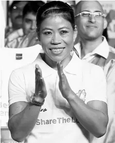  ??  ?? This file photo of Indian boxer Mary Kom at an event in Mumbai. — AFP photo