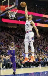  ?? CHRIS SZAGOLA — THE ASSOCIATED PRESS ?? Ben Simmons attempting a jump shot was one of the highlights of the 76ers’ win over the Lakers on Sunday.