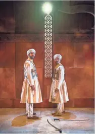  ?? MICHAEL BROSILOW ?? Yousof Sultani (left) and Owa’Aìs Azeem are on the job in “Guards at the Taj.”