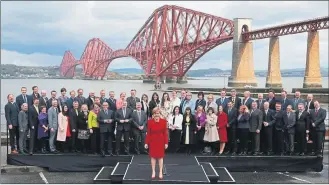  ??  ?? DISPARATE VOICES? First Minister Nicola Sturgeon with the 56 SNP MPs in South Queensferr­y soon after the General Election. It has been reported that there is debate over the strategy for independen­ce.