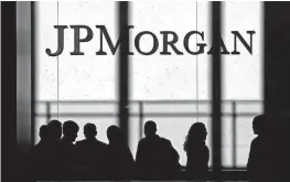  ?? ?? JPMorgan said Tuesday that $55 million of the settlement will go toward local charities and assistance for victims.