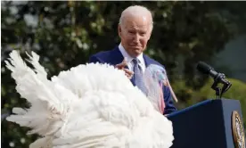  ?? Photograph: Susan Walsh/AP ?? Joe Biden with Liberty at the White House pardoning ceremony.