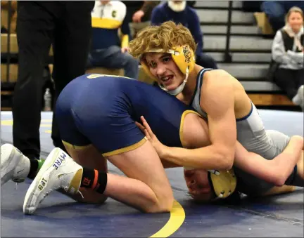  ?? JASON SCHMITT — FOR MEDIANEWS GROUP ?? Clarkston senior Brady Vogt wrestles Oxford’s Koen Eberhard in the 120-pound championsh­ip match at the Division 1individua­l regional Saturday at Hartland. Vogt defeated Eberhard, 9-7, to claim the title. Both qualified for the Individual Finals at Ford Field March 3-4.