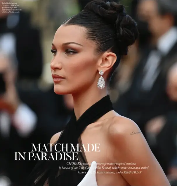  ??  ?? Bella Hadid wears Chopard’s 18k white gold earrings with pear shaped diamonds totalling 18.05 carats