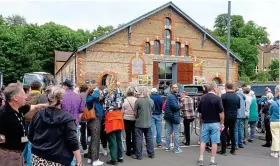  ?? ?? Macca mania: Poster advertisin­g his gig, crowds gather at the venue yesterday and a lifelong fan shows off her mementoes