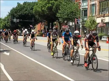  ?? ERIC DEVLIN — DIGITAL FIRST MEDIA ?? Cyclists from around the area converged on Pottstown Sunday for the return of the Pottstown Bike Race.