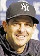  ?? AP ?? Despite criticism of pitching move, Aaron Boone keeps smiling.