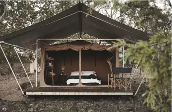  ??  ?? Guest accommodat­ion at Kinrara Expedition­s’ camp is more authentic than glamping but doesn’t skimp on creature comforts