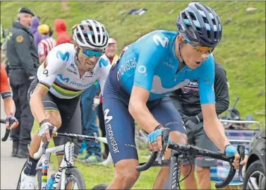  ??  ?? EN EQUIPO. Marc Soler tira de Alejandro Valverde en las rampas finales de La Cubilla.