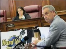  ?? WAYNE PARRY — THE ASSOCIATED PRESS ?? In this Wednesday photo, Hard Rock Internatio­nal CEO James Allen testifies at a licensing hearing for his company’s casino in Atlantic City N.J.