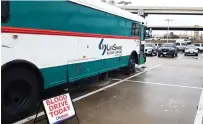  ?? Staff photo by Junius Stone ?? ■ The LifeShare blood donor bus was out at Classic Auto Park at 4333 Mall Lane, collecting blood for those in need.