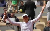  ?? MICHEL EULER — THE ASSOCIATED PRESS ?? Poland's Iga Swiatek celebrates winning her thirdround match against Montenegro's Danka Kovinic 6-3, 7-5 at the French Open on Saturday in Paris.