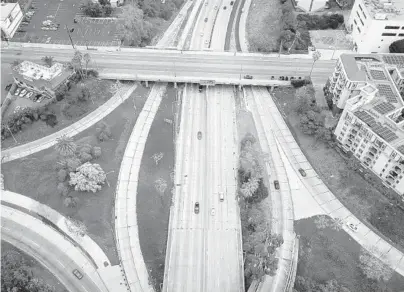  ?? CAROLYN COLE/LOS ANGELES TIMES ?? The 110 Freeway was very light on traffic heading north out of downtown Los Angeles in March.