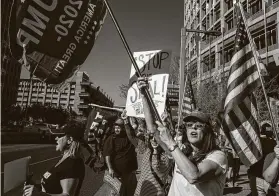 ?? Adriana Zehbrauska­s / New York Times ?? Trump supporters protest on Nov. 5 in Phoenix. Republican­s at the state and local level played a critical role in resisting pressure to overturn the vote.
