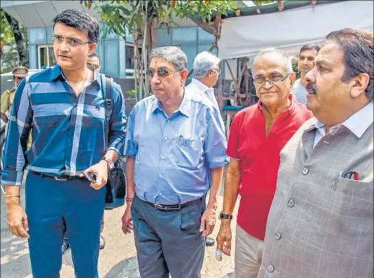  ?? AFP ?? (L-R) Sourav Ganguly, former BCCI president N Srinivasan, ex-secretary Niranjan Shah and former IPL chairman Rajeev Shukla at the BCCI headquarte­rs in Mumbai on Monday.