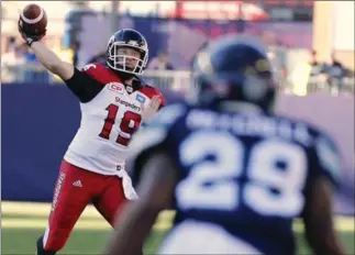  ?? TORONTO STAR FILE PHOTO ?? Calgary Stampeders quarterbac­k Bo Levi Mitchell launches a pass against the Argos earlier this month.