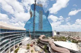  ??  ?? The Hard Rock Hollywood guitar hotel has added a nightclub that’s three parties in one..