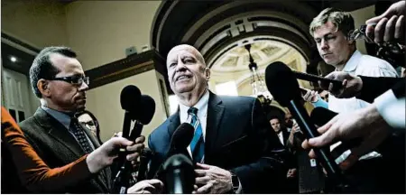  ?? WIN MCNAMEE/GETTY IMAGES ?? House Ways and Means Chairman Kevin Brady, R-Texas, talks to reporters about the GOP tax bill Friday. Republican­s plan to start voting on it Tuesday.