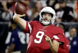  ?? Rick Scuteri The Associated Press ?? The 2018 season sees Arizona Cardinals quarterbac­k Sam Bradford staying healthy for all 16 games, keeping promising rookie Josh Rosen on the bench.